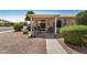 Outdoor patio with table, chairs, flowers, and a grill, perfect for relaxing at 1474 E Riviera Dr, Chandler, AZ 85249