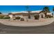 Corner lot with well-maintained landscaping, located at a street intersection at 1474 E Riviera Dr, Chandler, AZ 85249
