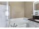 Close up view of jetted tub and shower in well-lit bathroom at 15025 E Scarlet Sky Ln # 1, Fountain Hills, AZ 85268