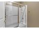 Modern bathroom featuring a shower with glass sliding door, faucet and showerhead at 15025 E Scarlet Sky Ln # 1, Fountain Hills, AZ 85268