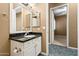 Bathroom with single sink vanity and granite counters at 15025 E Scarlet Sky Ln # 1, Fountain Hills, AZ 85268