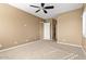 Neutral bedroom with neutral carpet and ceiling fan at 15025 E Scarlet Sky Ln # 1, Fountain Hills, AZ 85268