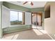Bright bedroom with neutral carpet, slider to deck, and views from its large shuttered window at 15025 E Scarlet Sky Ln # 1, Fountain Hills, AZ 85268