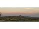 Scenic desert community sunset, showcasing mountain views and neighborhood charm at 15025 E Scarlet Sky Ln # 1, Fountain Hills, AZ 85268
