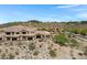 Desert home with covered patio, desert landscaping, and community views showcasing outdoor living and curb appeal at 15025 E Scarlet Sky Ln # 1, Fountain Hills, AZ 85268