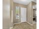 Welcoming front foyer with tiled floors and natural light at 15025 E Scarlet Sky Ln # 1, Fountain Hills, AZ 85268