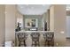 Cozy kitchen with breakfast bar and open access to dining area at 15025 E Scarlet Sky Ln # 1, Fountain Hills, AZ 85268