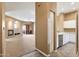 Open-concept living space with a fireplace and access to the outdoor patio at 15025 E Scarlet Sky Ln # 1, Fountain Hills, AZ 85268