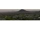 Panoramic view of a desert mountain range with houses below at 15025 E Scarlet Sky Ln # 1, Fountain Hills, AZ 85268