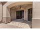 Covered outdoor patio featuring an archway, ceiling fan and desert views at 15025 E Scarlet Sky Ln # 1, Fountain Hills, AZ 85268