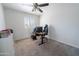 Bright bedroom with a ceiling fan, and a closet at 16610 S 21 St, Phoenix, AZ 85048