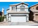 Charming two-story home with desert landscaping and a wide two car garage at 16610 S 21 St, Phoenix, AZ 85048
