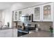 Well-maintained kitchen features granite countertops, stainless steel appliances, and ample cabinet space at 16610 S 21 St, Phoenix, AZ 85048