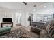 Open concept living room with view to kitchen, and hall at 16610 S 21 St, Phoenix, AZ 85048