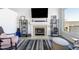 Cozy living room featuring fireplace and comfortable seating, ideal for relaxation at 16610 S 21 St, Phoenix, AZ 85048