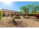 Expansive backyard with desert landscaping, mature trees, and privacy at 17139 S 174Th Dr, Goodyear, AZ 85338