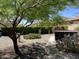 Landscaped backyard featuring desert plants, lush hedges, and a relaxing hot tub at 17139 S 174Th Dr, Goodyear, AZ 85338