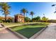 Well-maintained bocce ball courts with desert landscaping on a sunny day, perfect for outdoor recreation at 17139 S 174Th Dr, Goodyear, AZ 85338