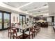 Spacious dining area featuring an oversized table, modern lighting, and ample seating for large groups at 17139 S 174Th Dr, Goodyear, AZ 85338