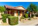 Charming single-story home with Southwestern architectural details, desert landscaping and a welcoming front porch at 17139 S 174Th Dr, Goodyear, AZ 85338