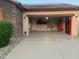 Spacious garage with epoxy floors, wall-mounted storage cabinets, and ample space for vehicles and storage at 17139 S 174Th Dr, Goodyear, AZ 85338
