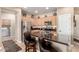 Well-equipped kitchen with stainless steel appliances, granite countertops and breakfast bar seating at 17139 S 174Th Dr, Goodyear, AZ 85338
