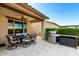 Outdoor patio with covered dining area and stainless steel grill, perfect for entertaining at 17139 S 174Th Dr, Goodyear, AZ 85338