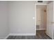 Bedroom with neutral paint and a doorway leading to the hall with storage for added appeal at 19511 N 76Th Ave, Glendale, AZ 85308