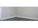 Bedroom featuring gray vinyl flooring, white trim, and neutral paint at 19511 N 76Th Ave, Glendale, AZ 85308