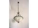 Elegant dining room chandelier with a white shade hangs from the ceiling, providing soft and inviting illumination at 19511 N 76Th Ave, Glendale, AZ 85308