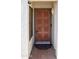 Stylish front door with decorative details and a welcoming entrance. Perfect home entry at 19511 N 76Th Ave, Glendale, AZ 85308