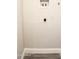 Laundry room with gray vinyl flooring and utility hookups at 19511 N 76Th Ave, Glendale, AZ 85308