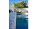 Refreshing swimming pool surrounded by lush trees and crisp white walls in a well-maintained outdoor space at 19511 N 76Th Ave, Glendale, AZ 85308