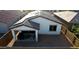 Aerial view of a house featuring a covered patio, cozy seating, and an easy-to-maintain backyard at 1972 N Loretta Pl, Casa Grande, AZ 85122