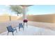 Private backyard with a covered patio, grill, and seating area, perfect for outdoor entertaining at 1972 N Loretta Pl, Casa Grande, AZ 85122