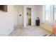 Bright bedroom with closet, storage cart, and window with natural light at 1972 N Loretta Pl, Casa Grande, AZ 85122