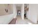 Inviting hallway featuring neutral tones, tile flooring, and an art piece at 1972 N Loretta Pl, Casa Grande, AZ 85122