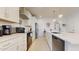Bright kitchen with modern appliances and a spacious island with bar seating at 1972 N Loretta Pl, Casa Grande, AZ 85122