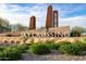 Striking 'Sky Crossing' community sign with modern architecture and landscaping, setting a welcoming tone at 21930 N 29Th St, Phoenix, AZ 85050