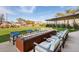 Inviting outdoor fire pit area with modern seating, perfect for relaxing evenings in the community at 21930 N 29Th St, Phoenix, AZ 85050