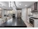 Bright and spacious kitchen with an island, stainless steel appliances, and stylish pendant lighting at 21930 N 29Th St, Phoenix, AZ 85050