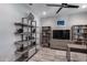 Comfortable living area with tile floors, shelving, a flat screen tv, and neutral wall colors at 21930 N 29Th St, Phoenix, AZ 85050