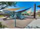 Community playground features shade sails, slide, and climbing structures at 21930 N 29Th St, Phoenix, AZ 85050
