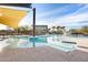 Inviting community pool with shaded seating areas, perfect for relaxing and socializing at 21930 N 29Th St, Phoenix, AZ 85050