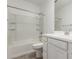 Bright bathroom features a white vanity, toilet, and shower/tub combo at 2464 N Morrison Ave, Casa Grande, AZ 85122
