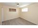 Cozy bedroom with light wood flooring and windows, perfect for rest and relaxation at 2614 W Greenway Rd, Tempe, AZ 85282