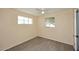 Bedroom showcasing wood-look flooring, two windows, and neutral walls at 2614 W Greenway Rd, Tempe, AZ 85282