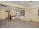 Open-concept living area featuring tile flooring and plenty of natural light at 2614 W Greenway Rd, Tempe, AZ 85282