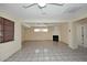 Bright living room featuring tiled floors and cozy fireplace for comfortable living at 2614 W Greenway Rd, Tempe, AZ 85282