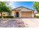 Charming single-story home featuring a well-maintained front yard, brick driveway, and a two-car garage at 2731 E Cherry Hill Dr, Gilbert, AZ 85298